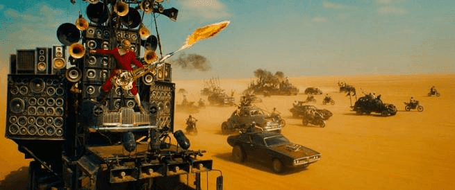 Film frame from Mad Max: Fury Road desert chase scene